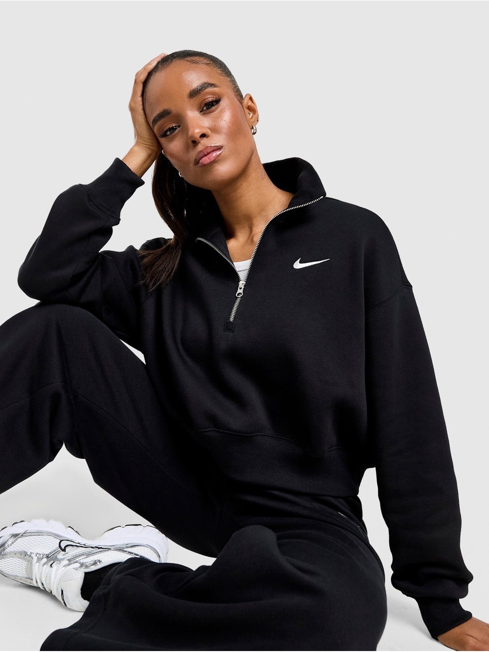 Nike Black Half-Zip Pullover with White Swoosh Logo